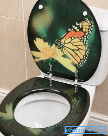 Couvercle de toilette esthétique, décoré d'un motif papillon Couvercle de toilette esthétique, décoré d'un motif papillon
