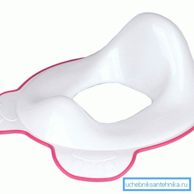Photo d'un siège de toilette anatomique pour enfant Photo d'un siège de toilette anatomique pour enfant