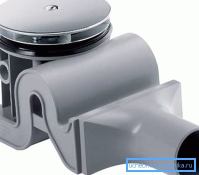 Photo d'un modèle compact de siphon de douche Photo d'un modèle compact de siphon de douche