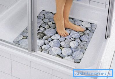 Tapis avec impression de photos sous forme de galets. Tapis avec impression de photos sous forme de galets.