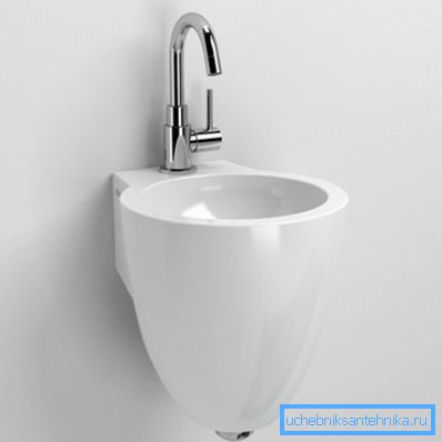 Sur la photo - la cuvette a un diamètre de 270 mm, ce qui est probablement le plus petit lavabo des toilettes. Sur la photo - la cuvette a un diamètre de 270 mm, ce qui est probablement le plus petit lavabo des toilettes.