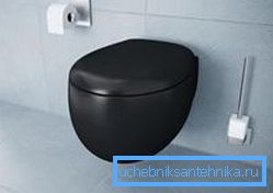 Formes arrondies de toilettes noires dans un style moderne Formes arrondies de toilettes noires dans un style moderne