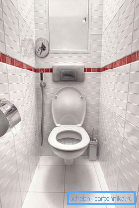 Toilette suspendue dans une petite salle de toilette. Toilette suspendue dans une petite salle de toilette.