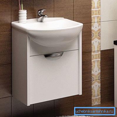 Lavabo 50 à 50 cm dans une armoire suspendue. Lavabo 50 à 50 cm dans une armoire suspendue.